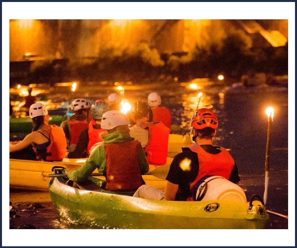 La Salle les Alpes. Descente aux flambeaux en raft sur la Guisane