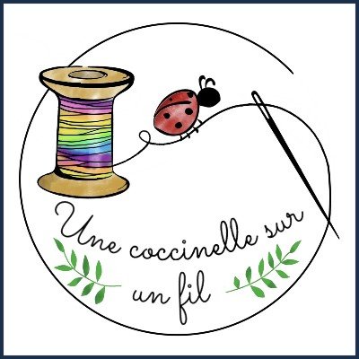 Une Coccinelle sur un Fil
